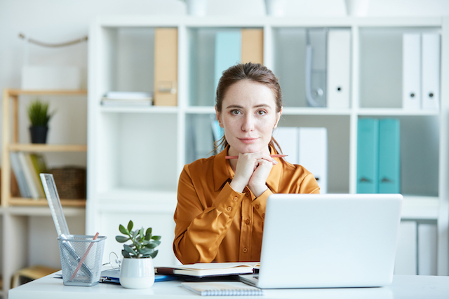 Female leader working at office